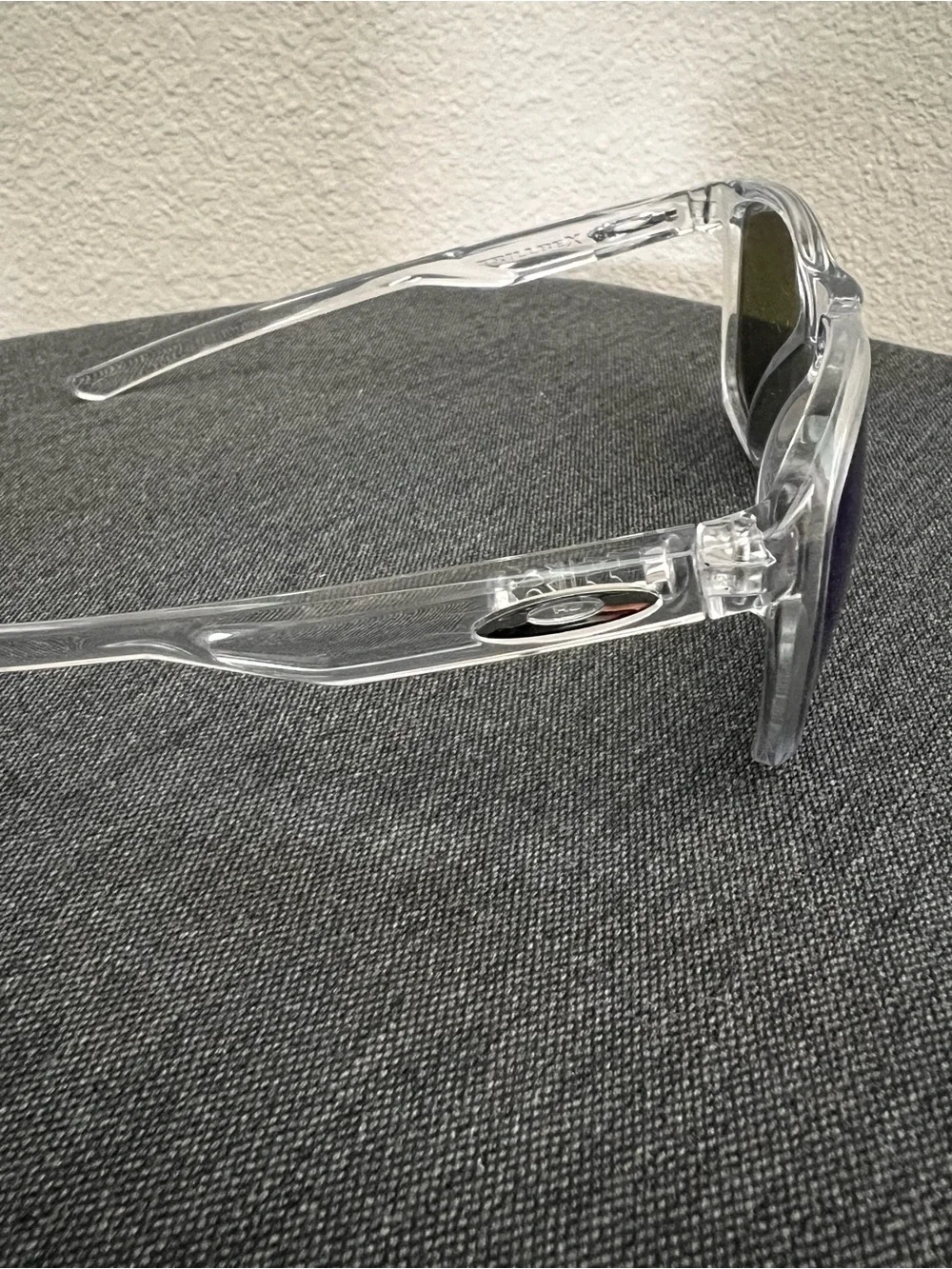 Oakley Clear Frame Sunglasses with Bright Blue Mirrored Lenses